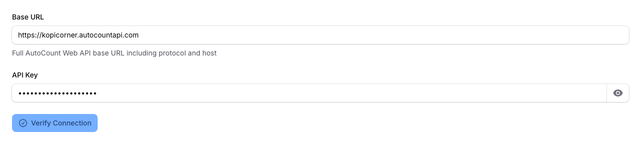 Step 3: The blue connection-test button below the entered Base URL and API Key