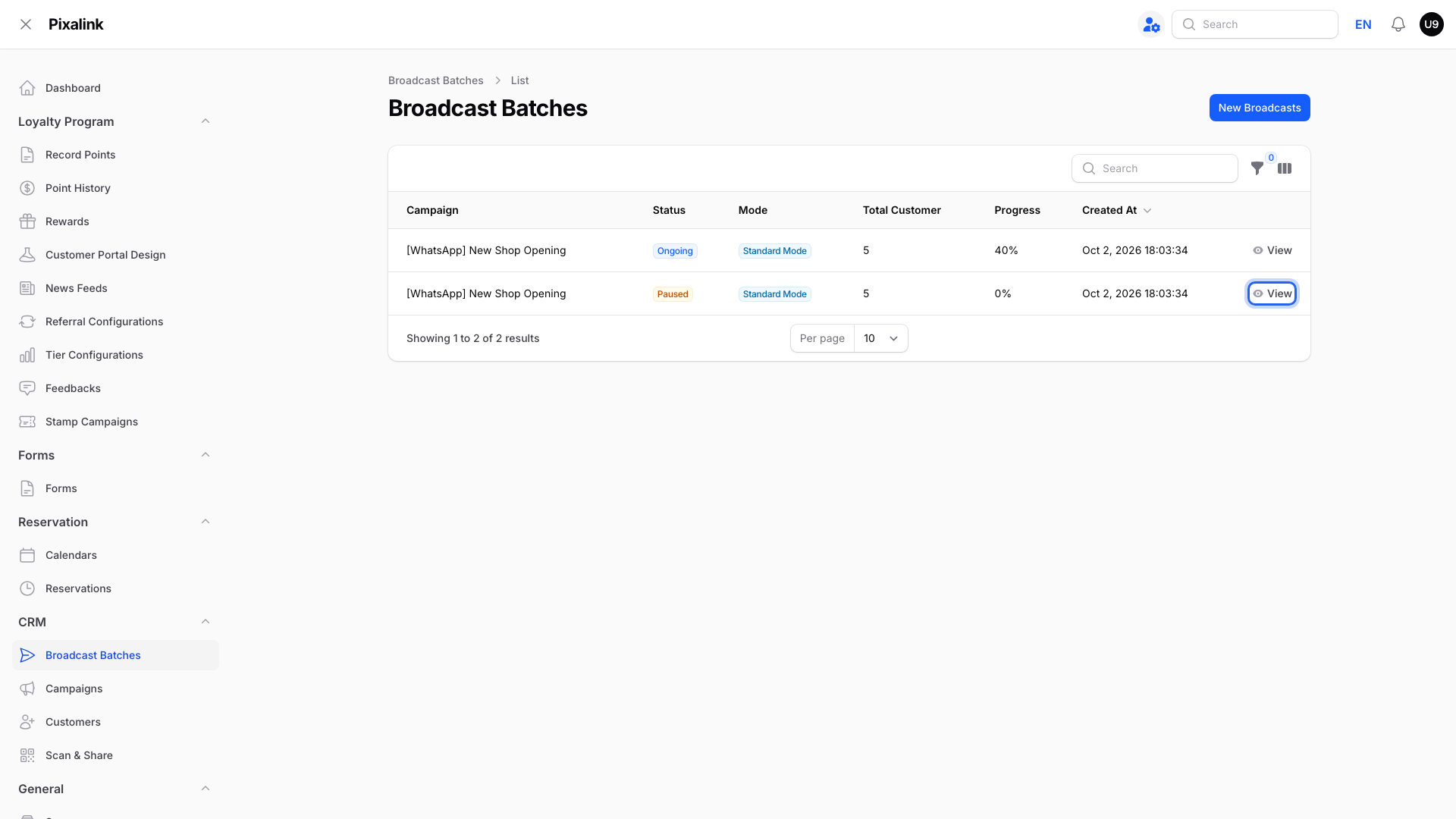 Broadcast Batches list with one Ongoing and one Paused batch, and the View button on the Paused batch highlighted