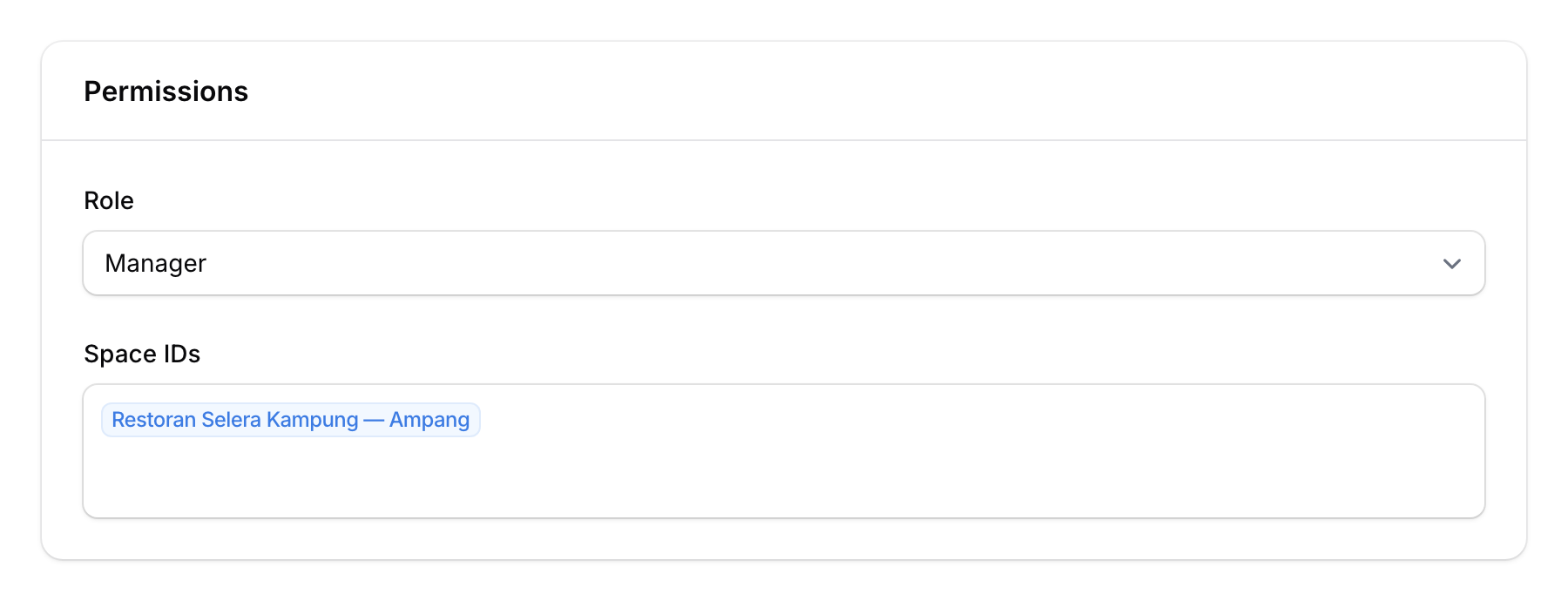 Role selector and Space IDs multi-select for restricting team member access