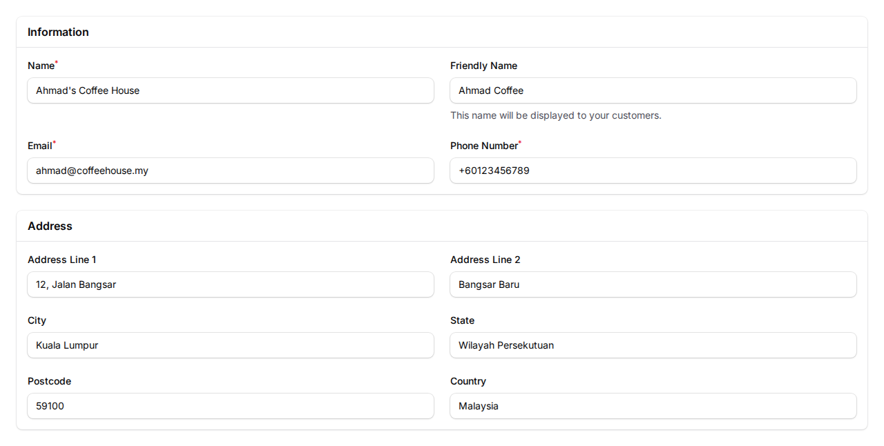 Organisation Information form showing the Information section with Name, Friendly Name, Email, Phone Number fields and Address section with Address Line 1, Address Line 2, City, State, Postcode, Country fields filled with sample data