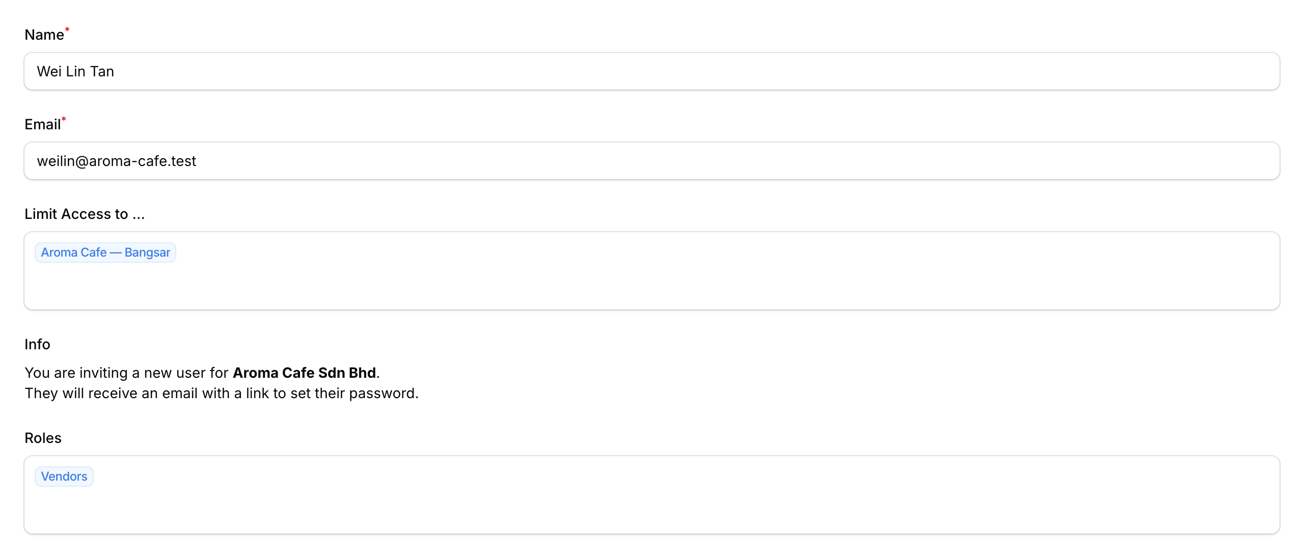 Step 5: The completed invite form ready to save with name, email, outlet access, and role filled in